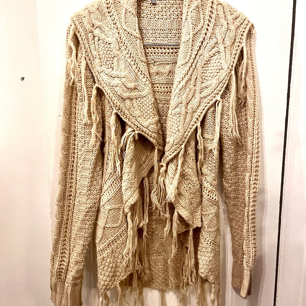 Charlotte Russe Bohemian style cardigan with fringes.